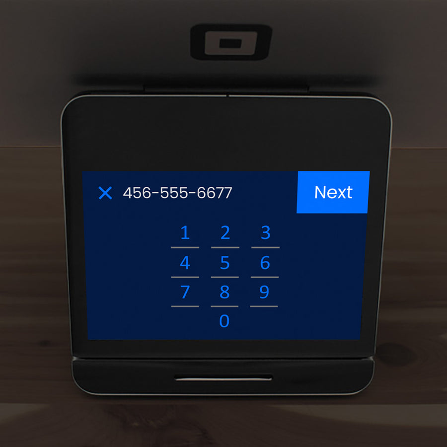 Register keypad with a phone number entered and the Next button