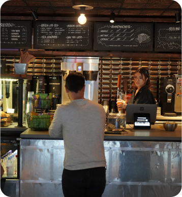 Ground Central cashier serving a customer