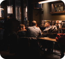 Guests talking over coffee at a Ground Central café