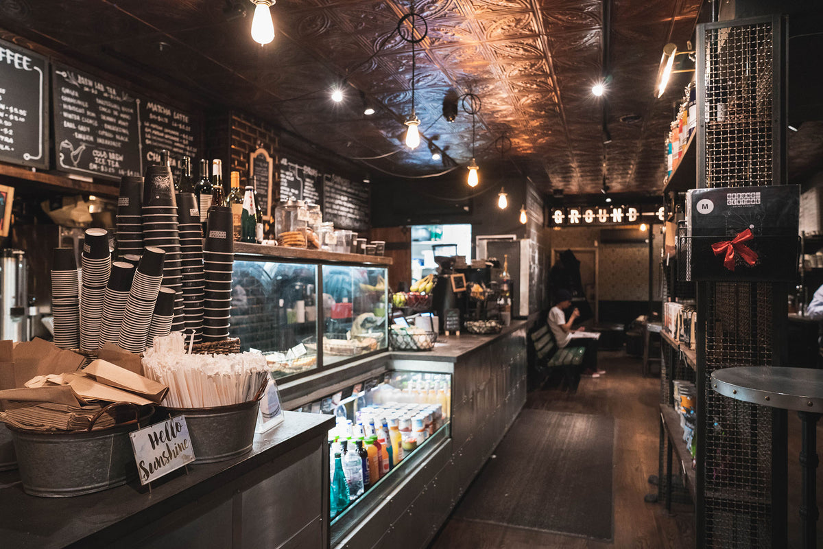 Pastry case and back-counter seating at GC Hell's Kitchen