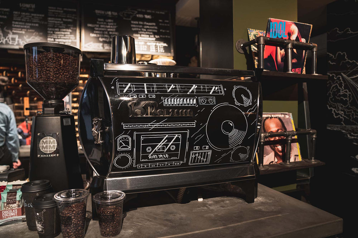 Espresso machine and grinder on the counter at GC Murray Hill