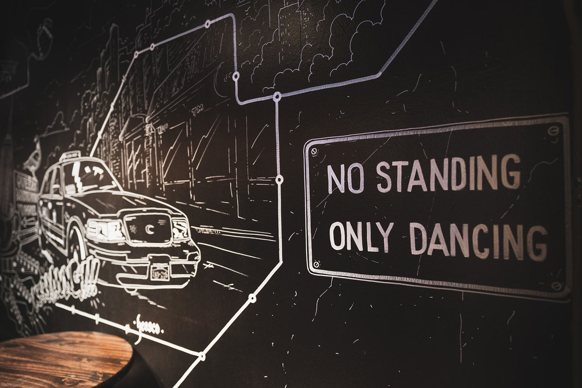 Chalk mural reading No Standing Only Dancing at GC Murray Hill